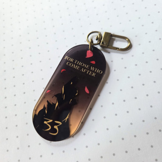 EXPEDITION 33 ACRYLIC CHARM