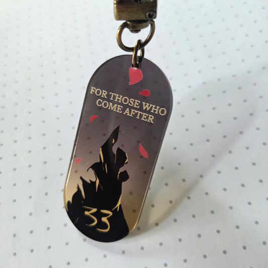 EXPEDITION 33 ACRYLIC CHARM